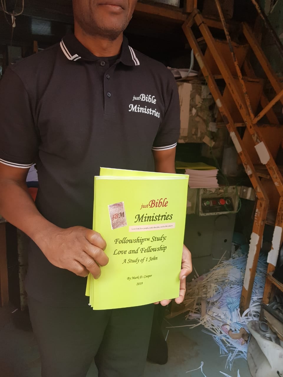 1 John notebooks at the print shop, 2022.