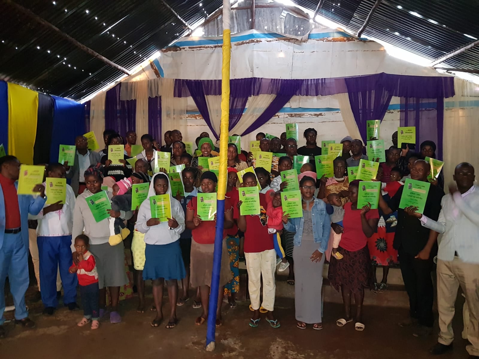Green justBible booklets in Kenya, 2023.