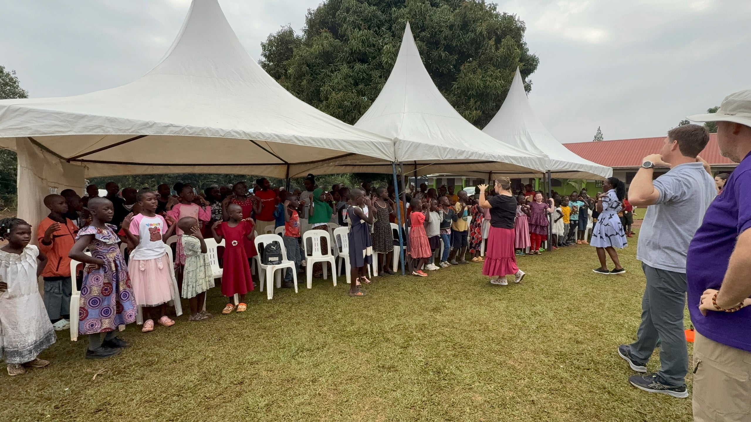 Activity leaders under the tents, 2025.