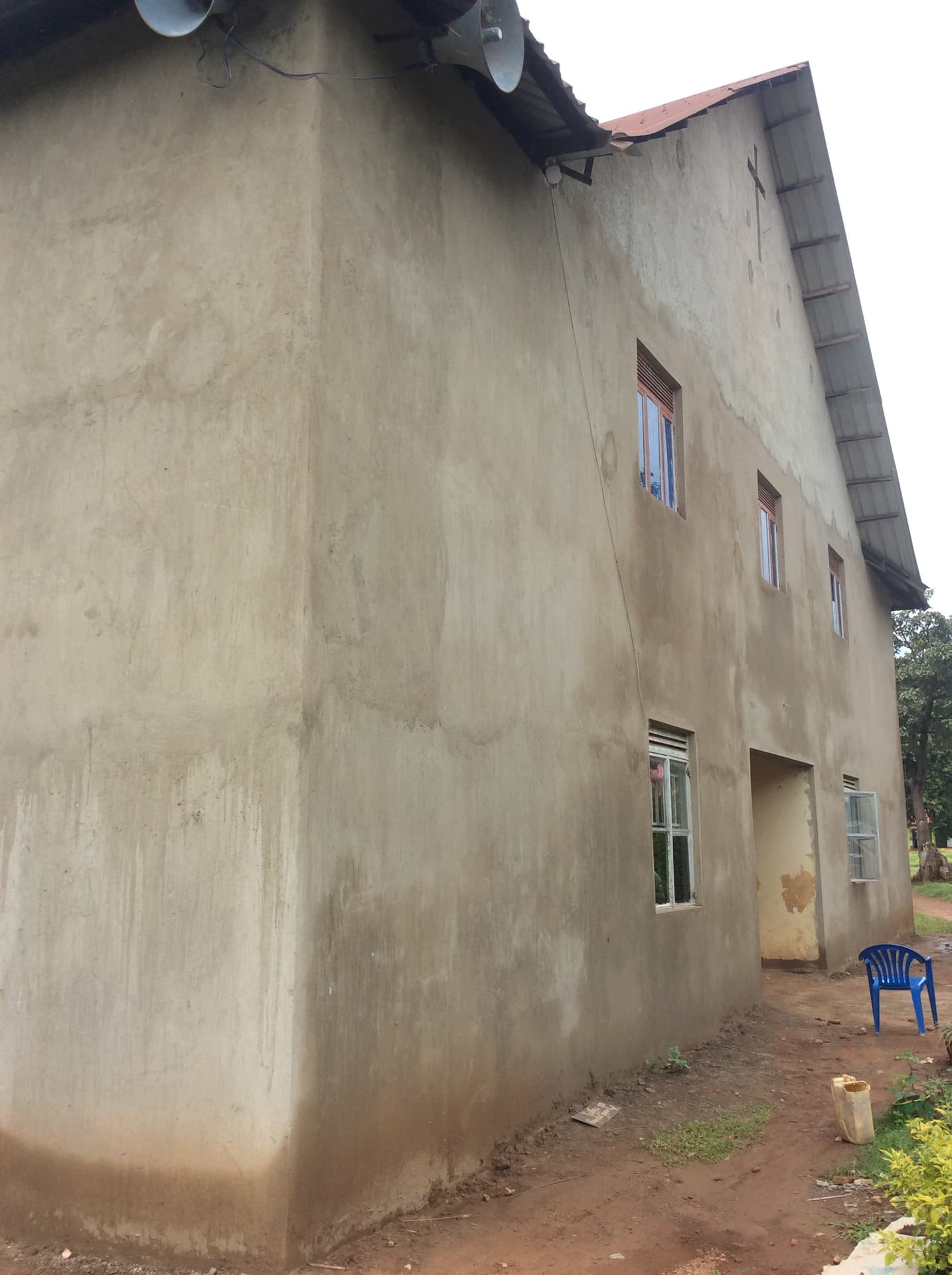 Plastered front of Zion's hall, 2021.